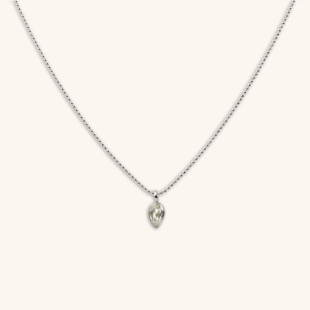 Silver necklace with a teardrop-shaped Green Amethyst (Prasiolite) pendant on a white background