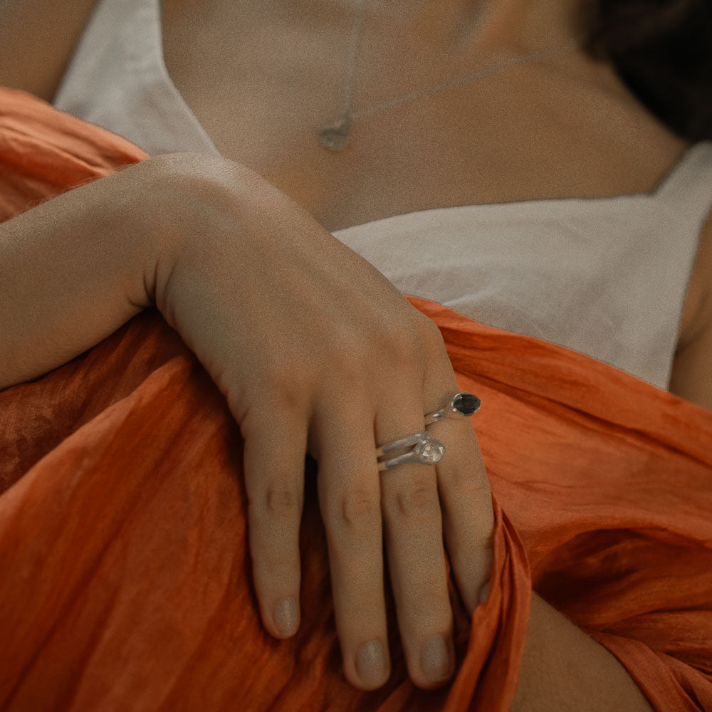 woman wearing marquise moonstone gemstone ring