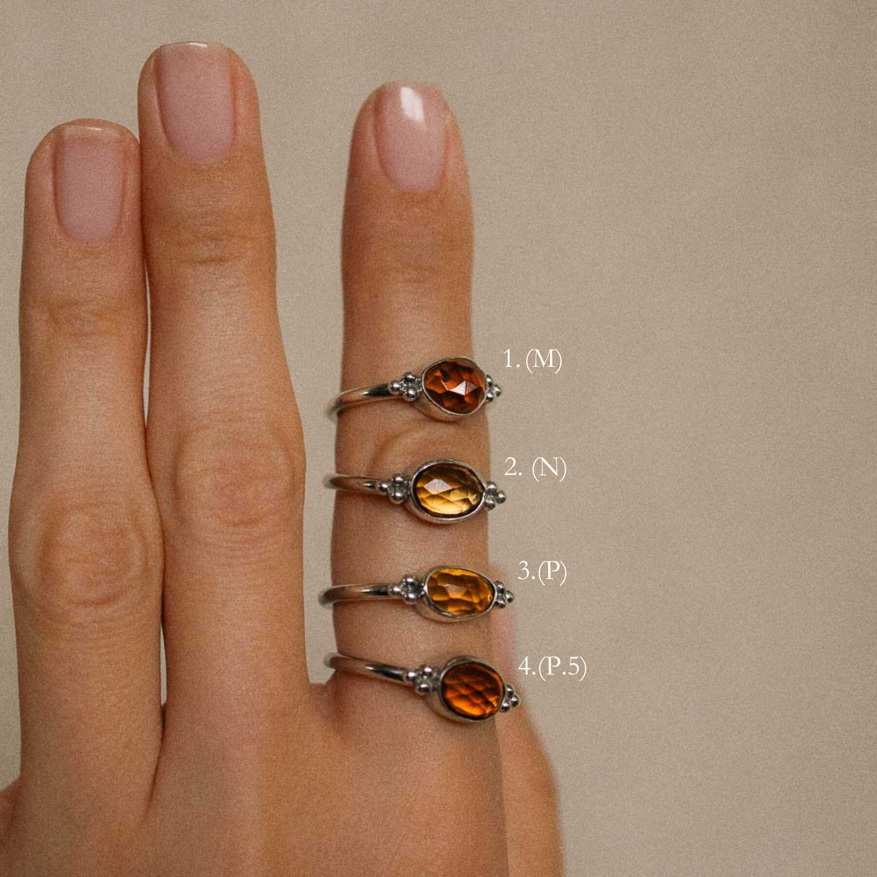 orange tourmaline rings on women's finger options
