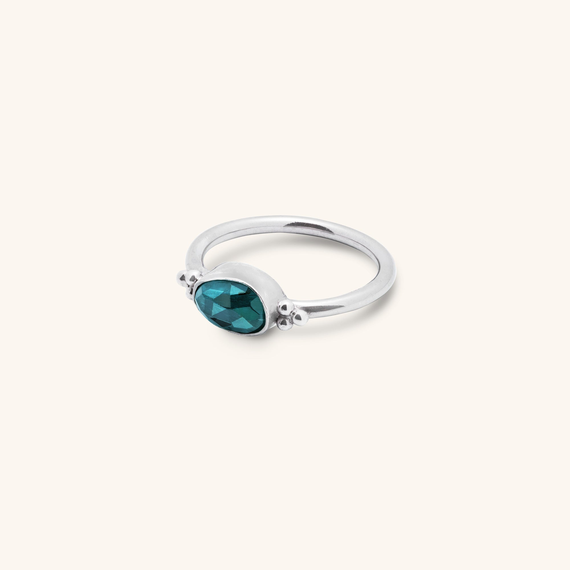 organic oval rose-cut Blue Tourmaline bezel set sterling silver ring with silver ball decoration