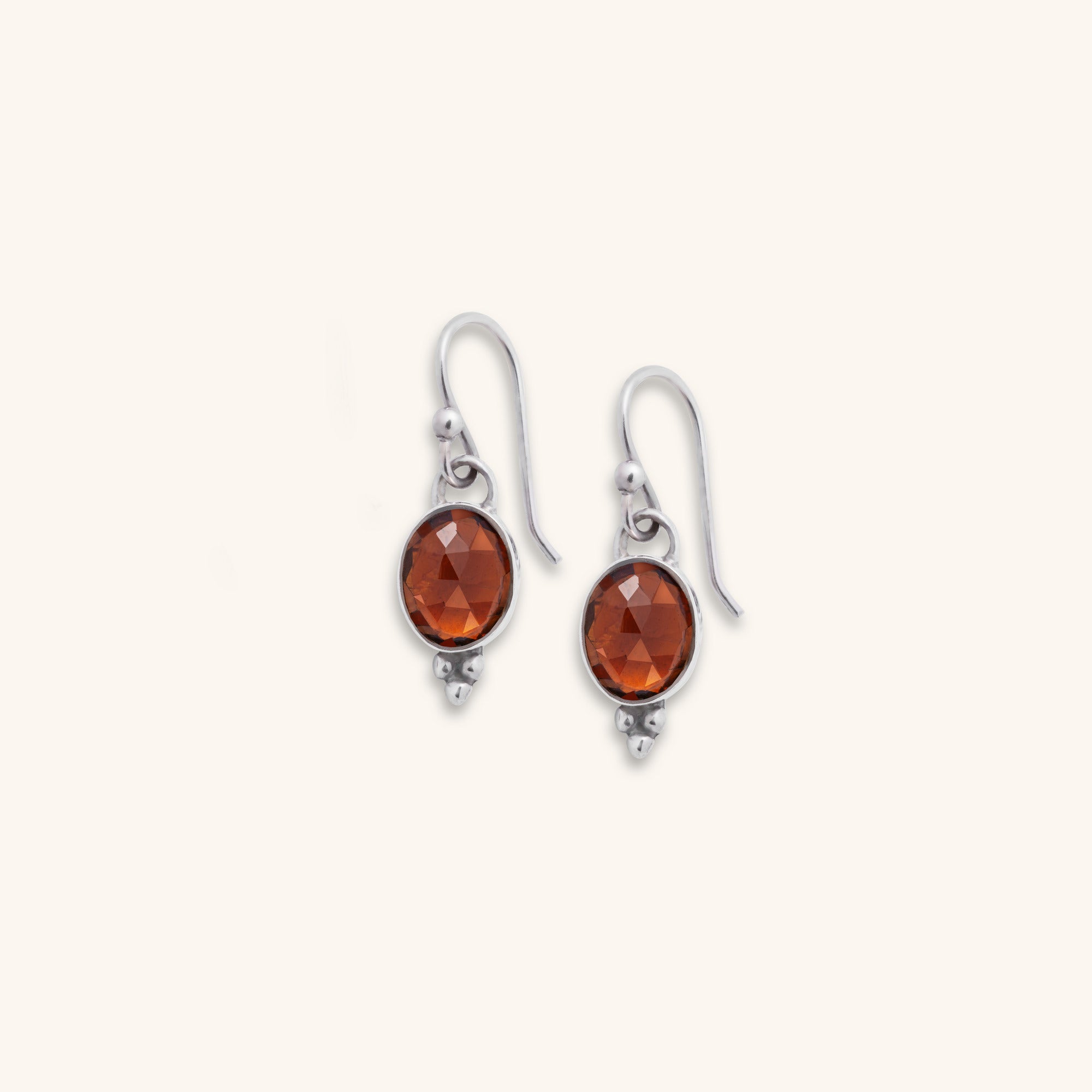 organic oval rose-cut Orange Tourmaline bezel set sterling silver earring with silver ball decoration