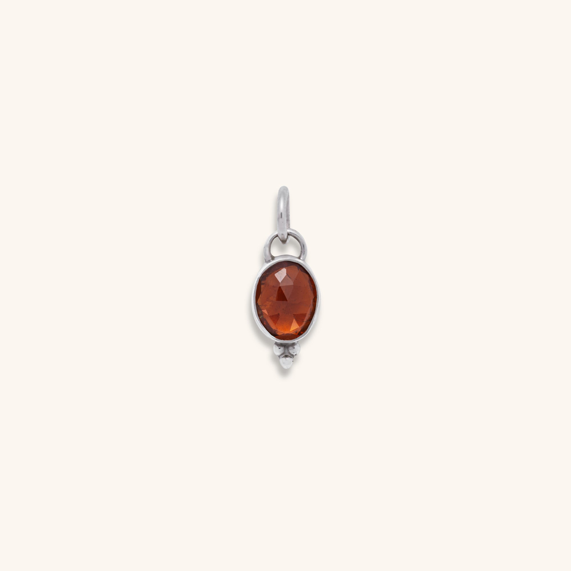 organic oval rose-cut Orange Tourmaline bezel set sterling silver pendant with silver ball decoration