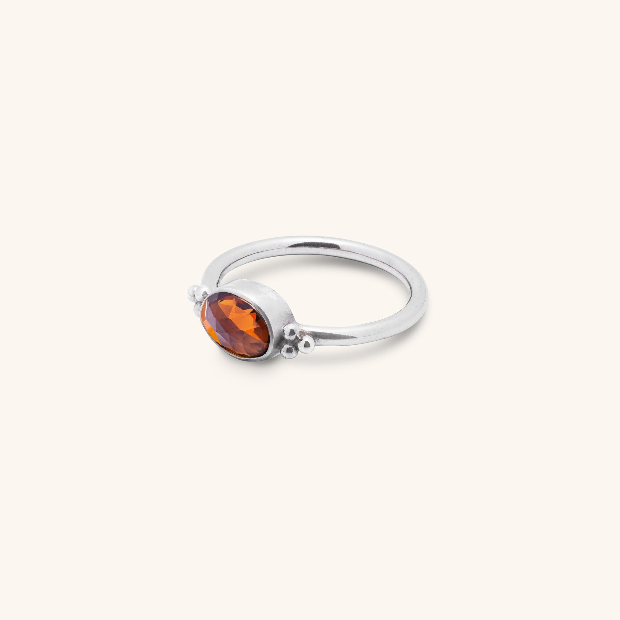 organic oval rose-cut Orange Tourmaline bezel set sterling silver ring with silver ball decoration