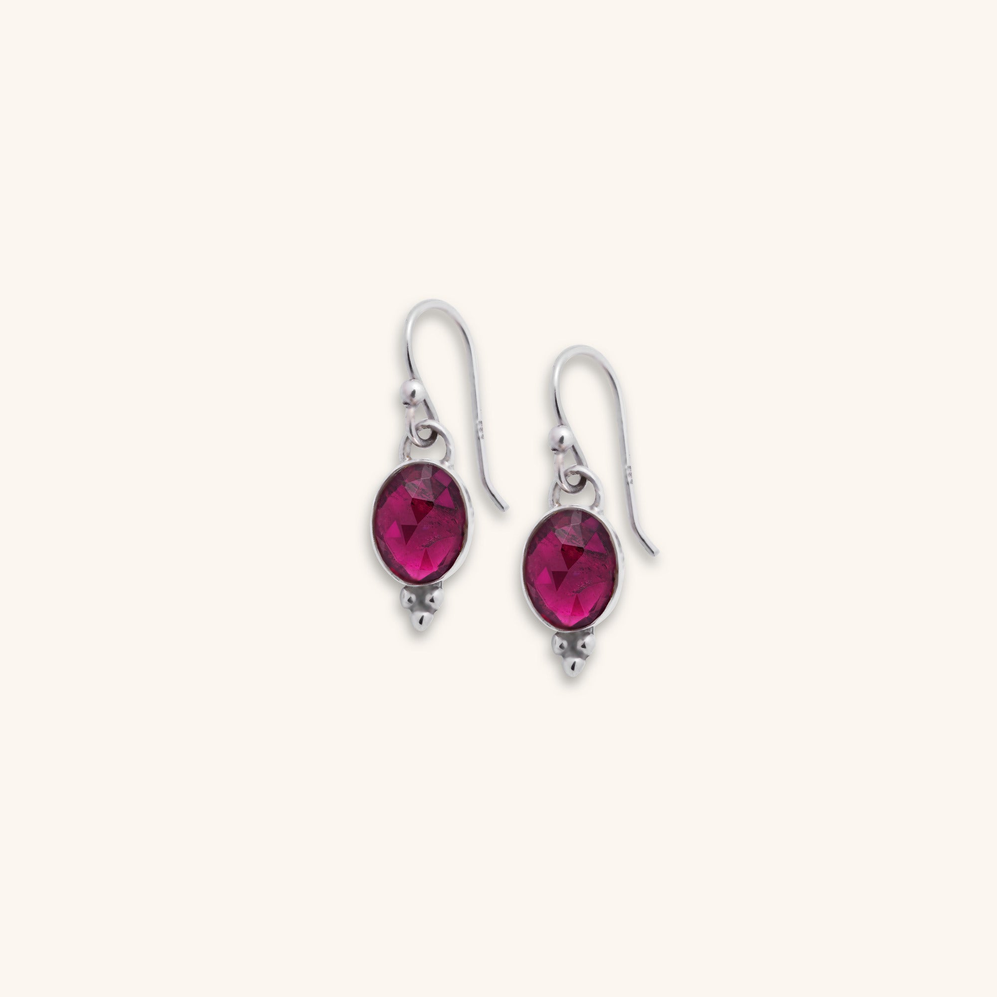 a pair of gemstone rose-cut Pink Tourmaline bezel set sterling silver dangle earrings with silver ball decoration