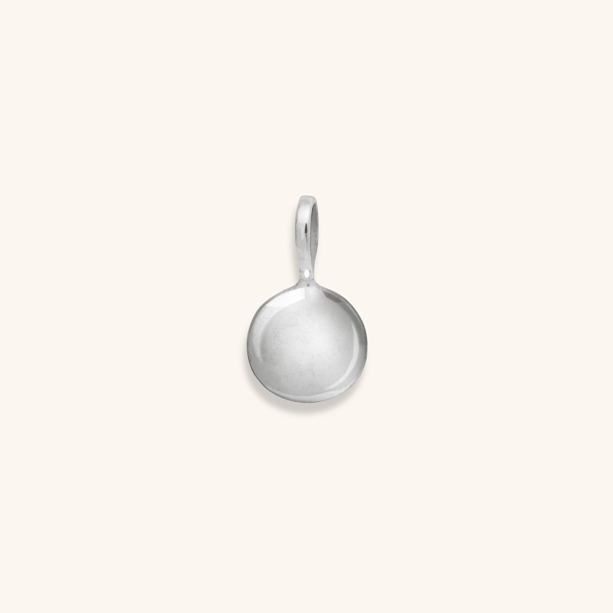 round disc polished sterling silver pendant by Inesce Jewellery