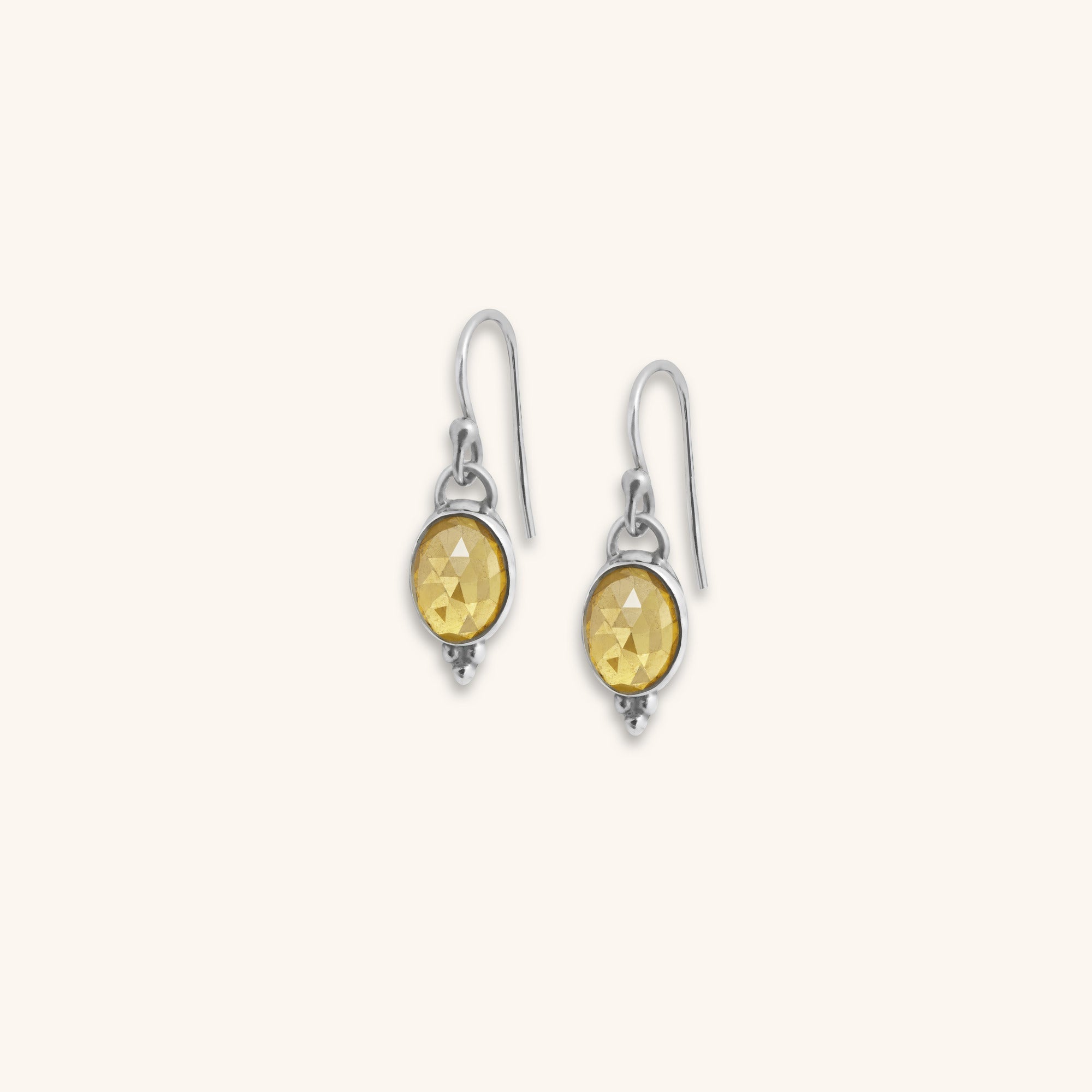 a pair of gemstone rose-cut Yellow Tourmaline bezel set sterling silver dangle earrings with silver ball decoration