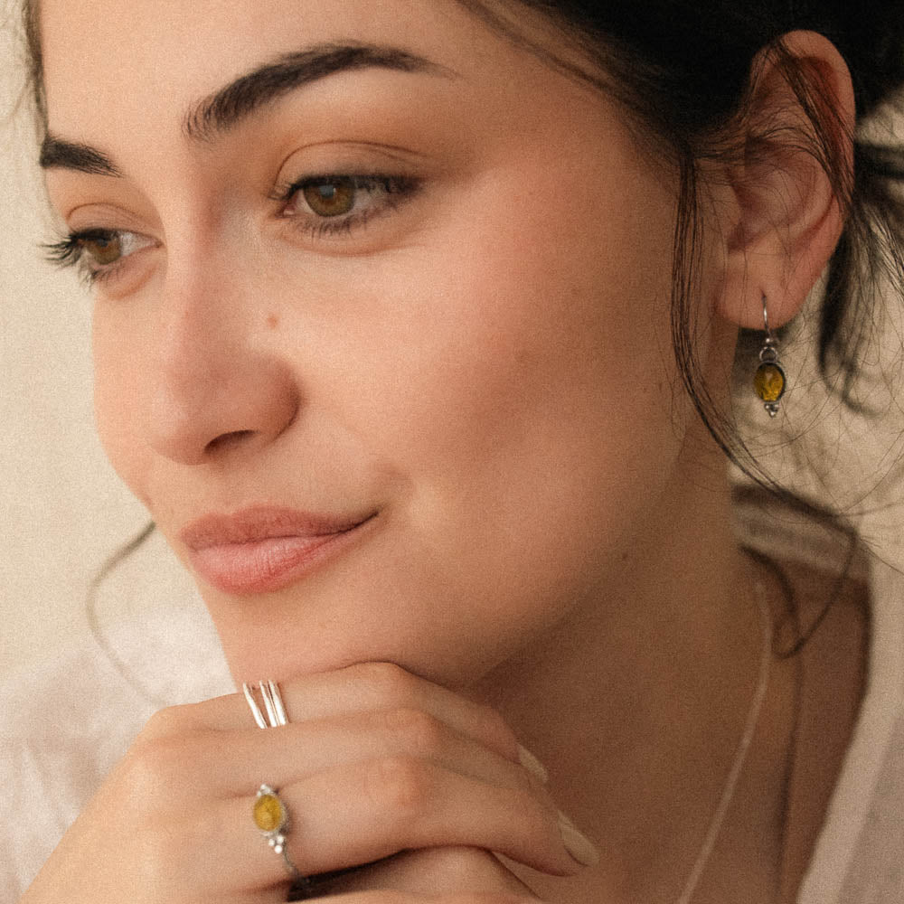 women wearing yellow tourmaline earrings