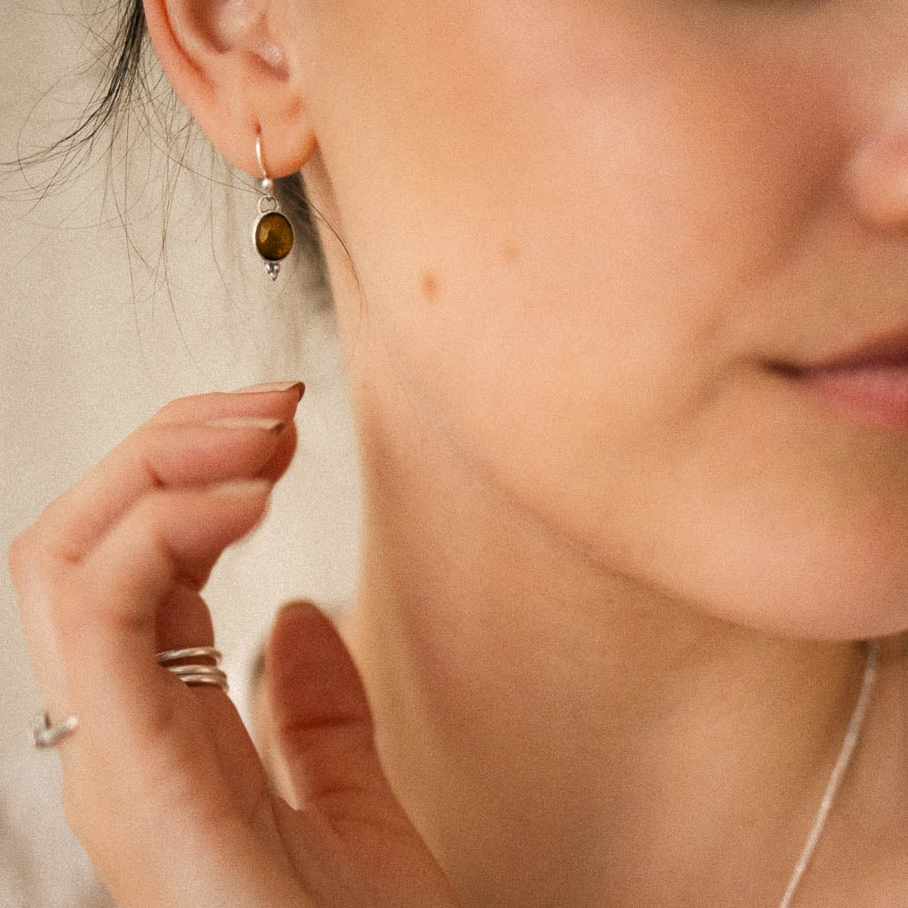 women wearing yellow tourmaline earrings