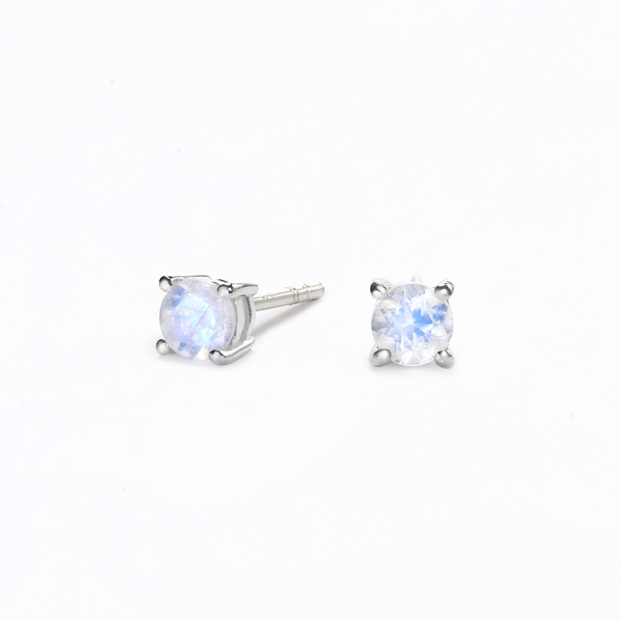 mini small round moonstone earring studs on white background