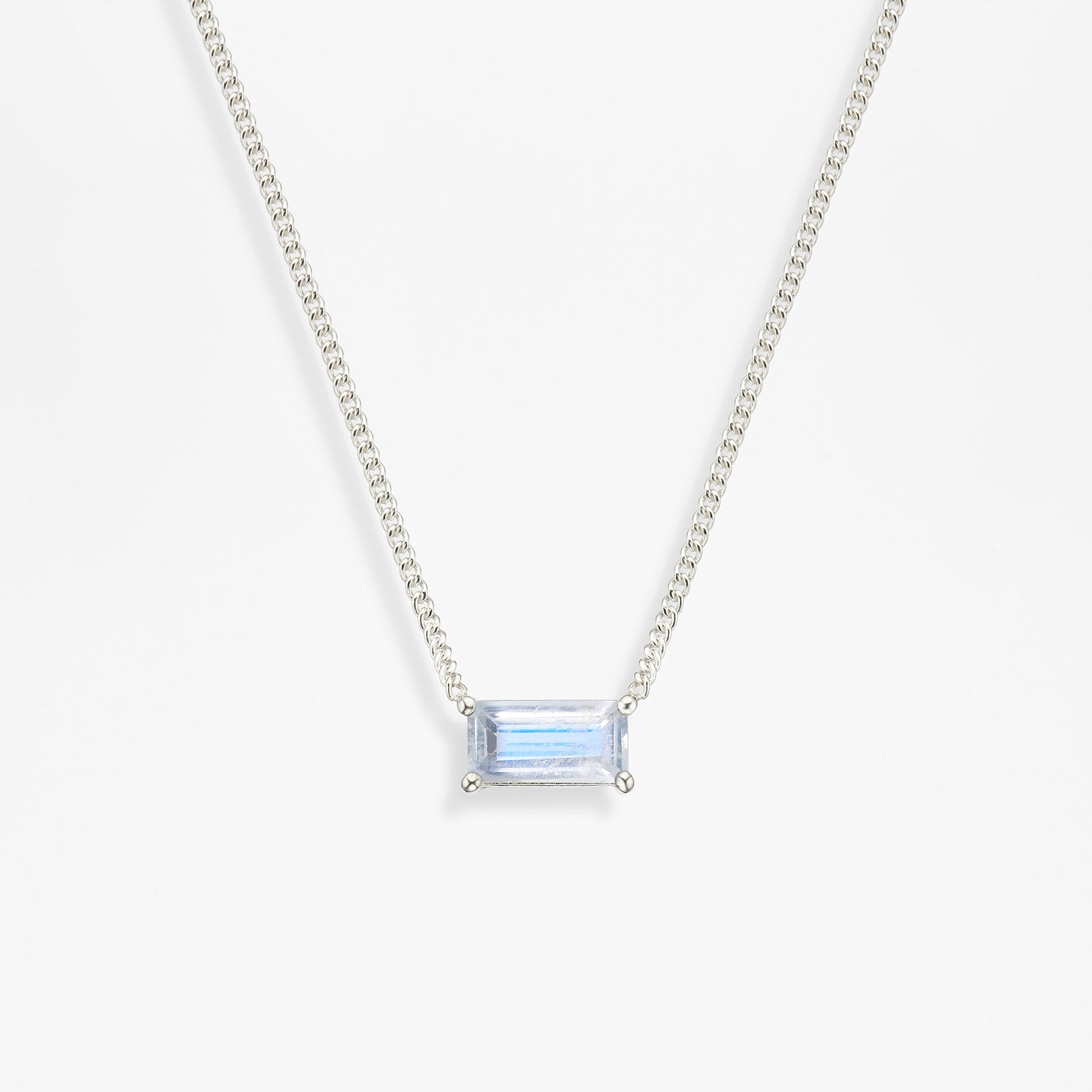 horizontal baguette moonstone necklace on white background fine chain